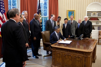 Obama signs US-Korea Free Trade Agreement